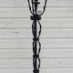Black wrought iron floor lamp attributed to Gilbert Poillerat