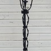Black wrought iron floor lamp attributed to Gilbert Poillerat