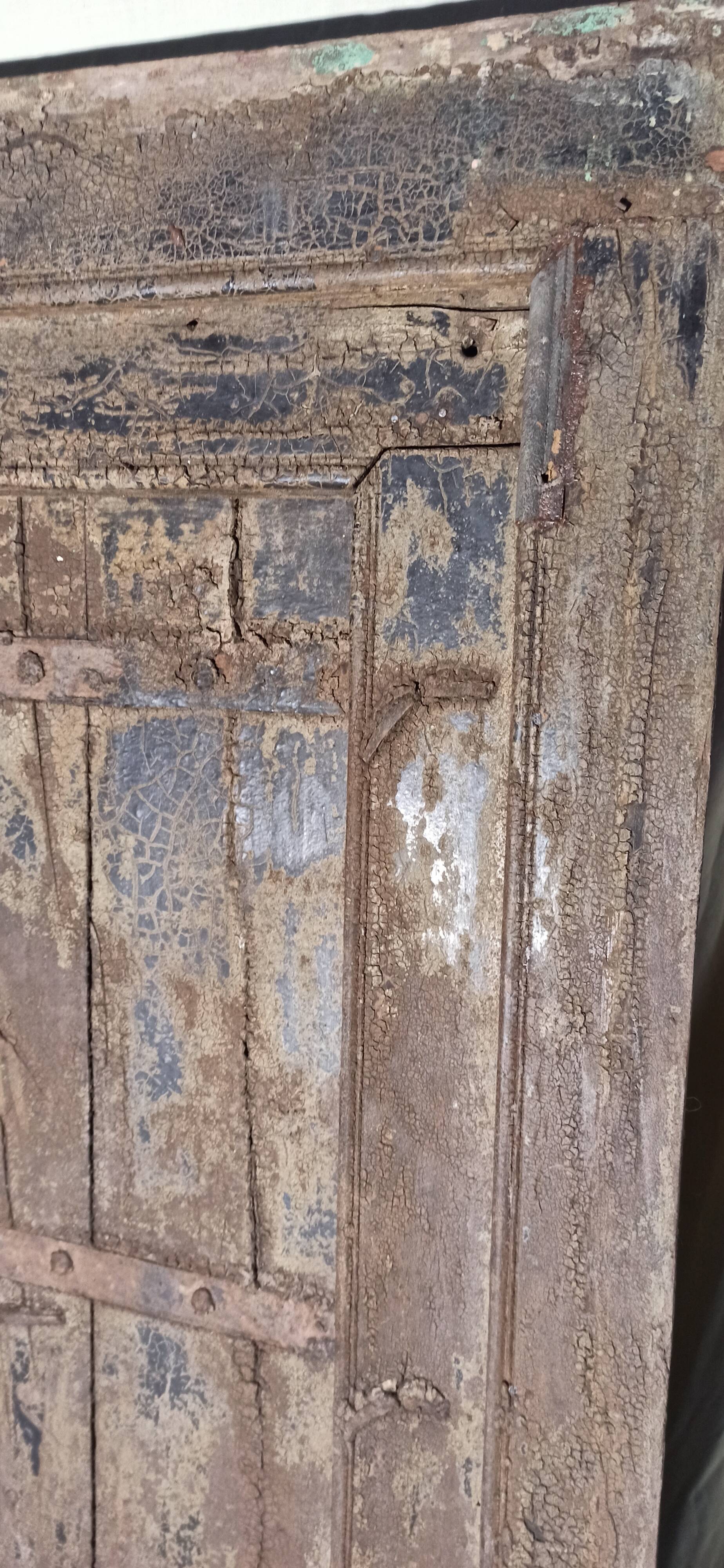 Old wooden door with frame
