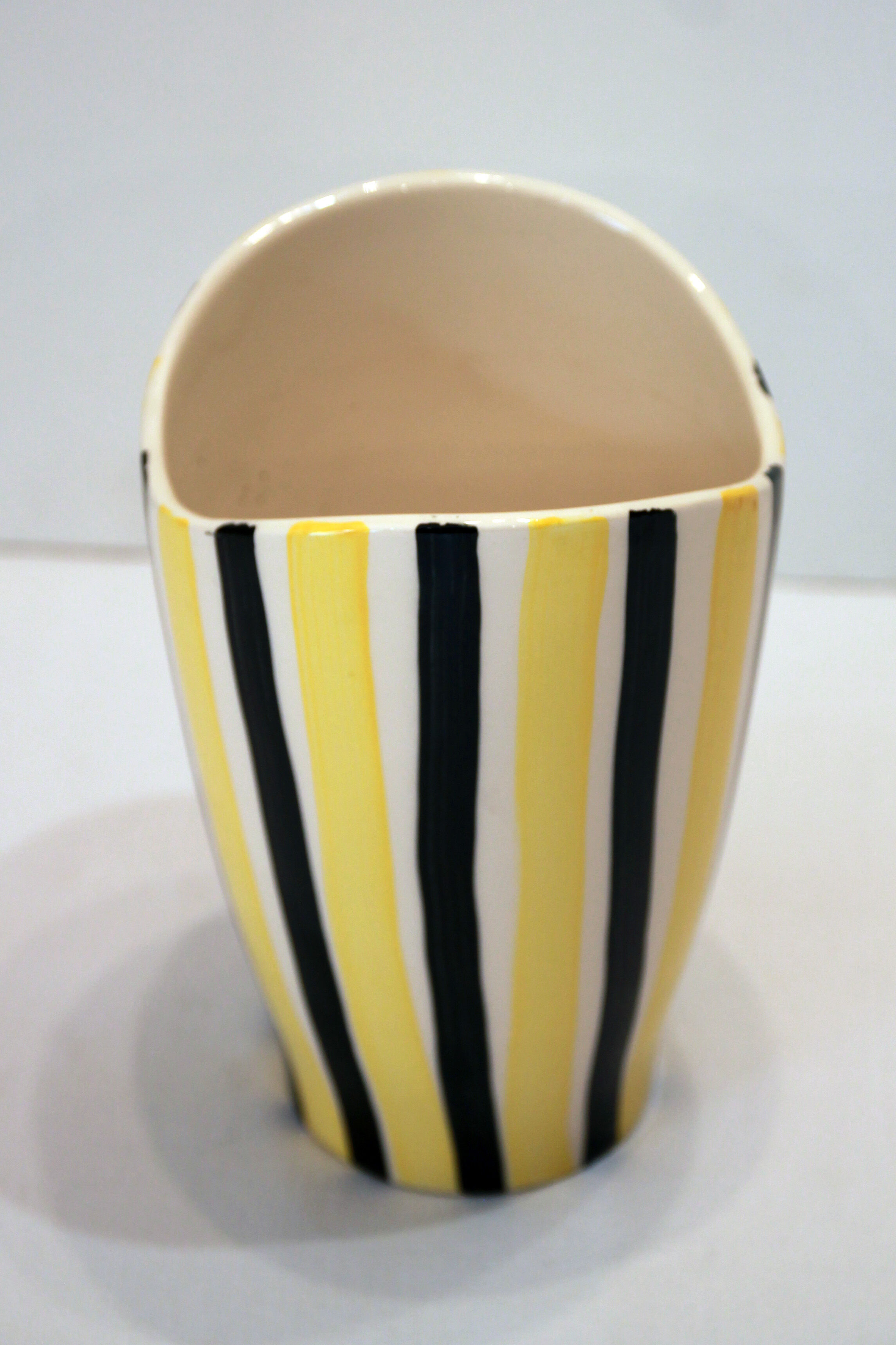 Yellow and black ceramic vase