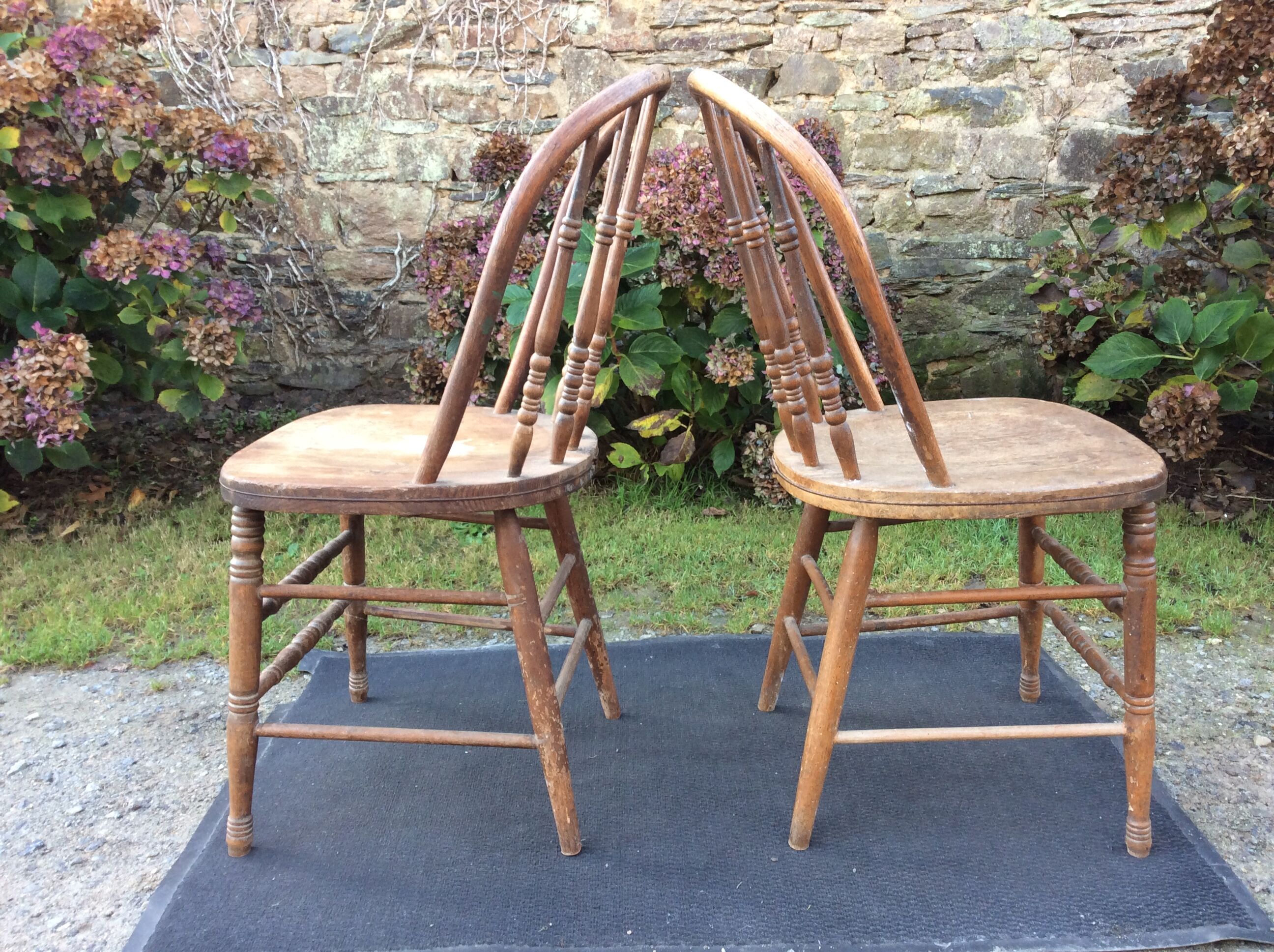 2 vintage bistro chairs called gondolas in solid oak.