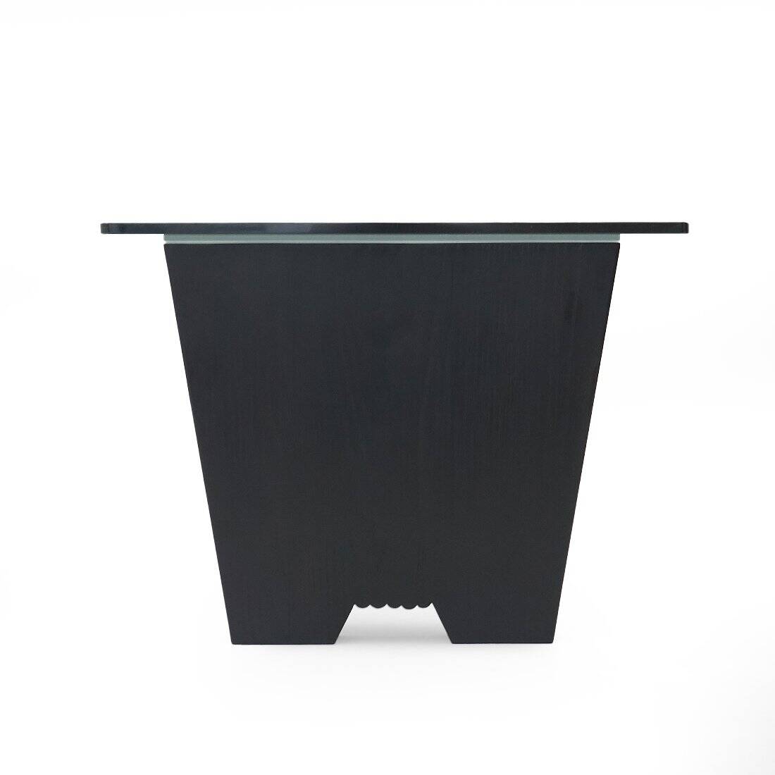 Coffee table with a glass top and black stained wood frame, 1930s.