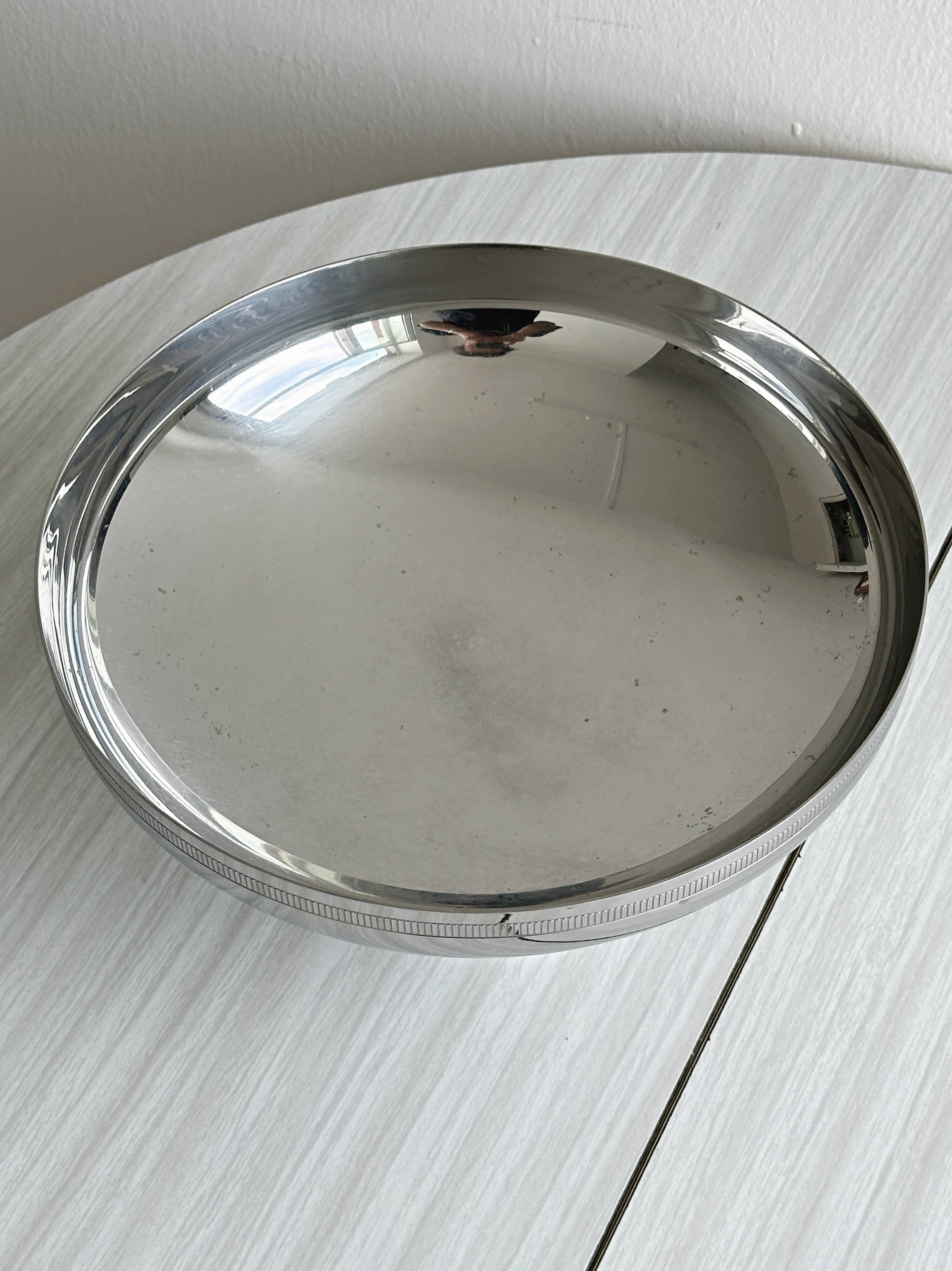 Coupe sur pied en métal inox argenté