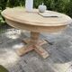 Extendable round table made of solid oak