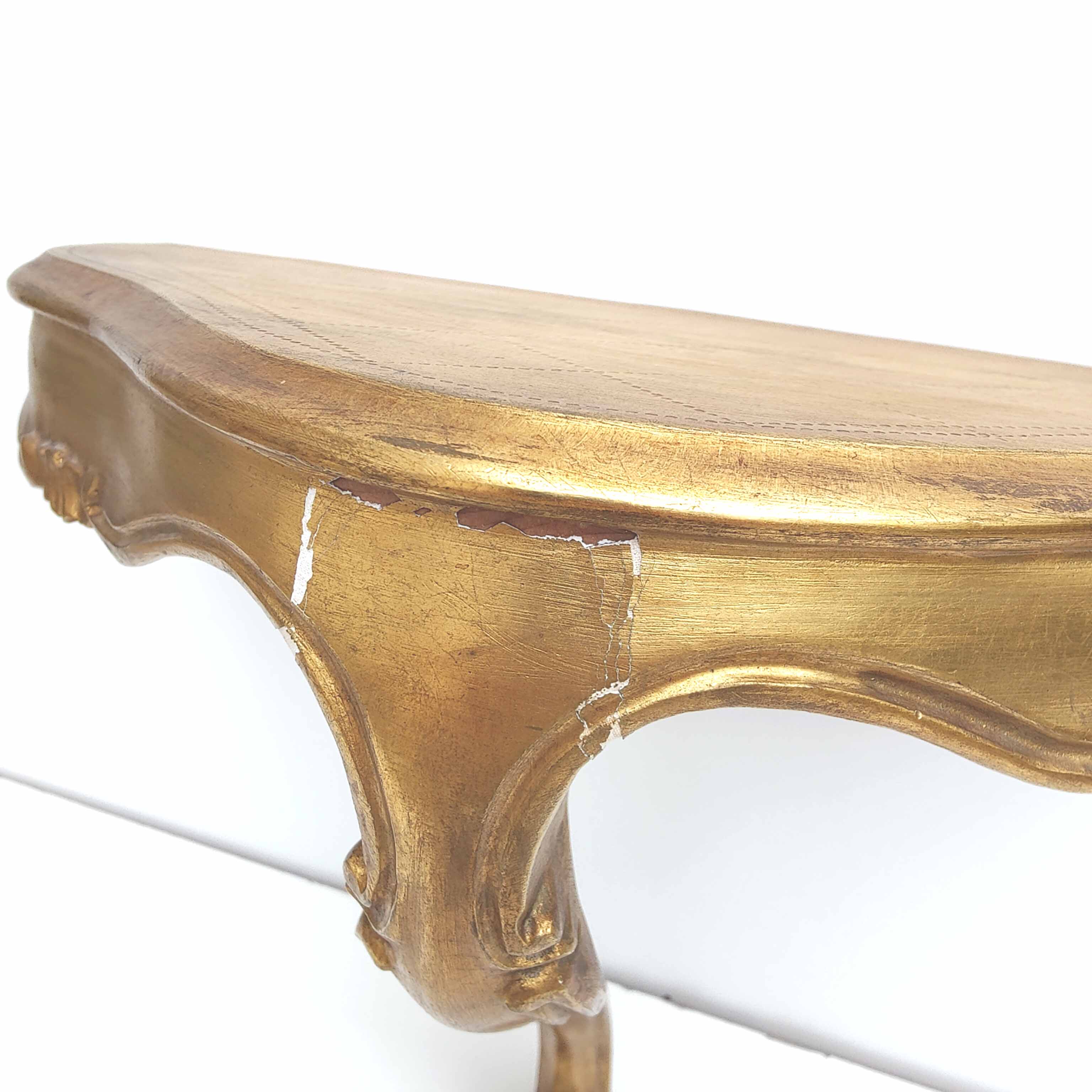 Small golden console