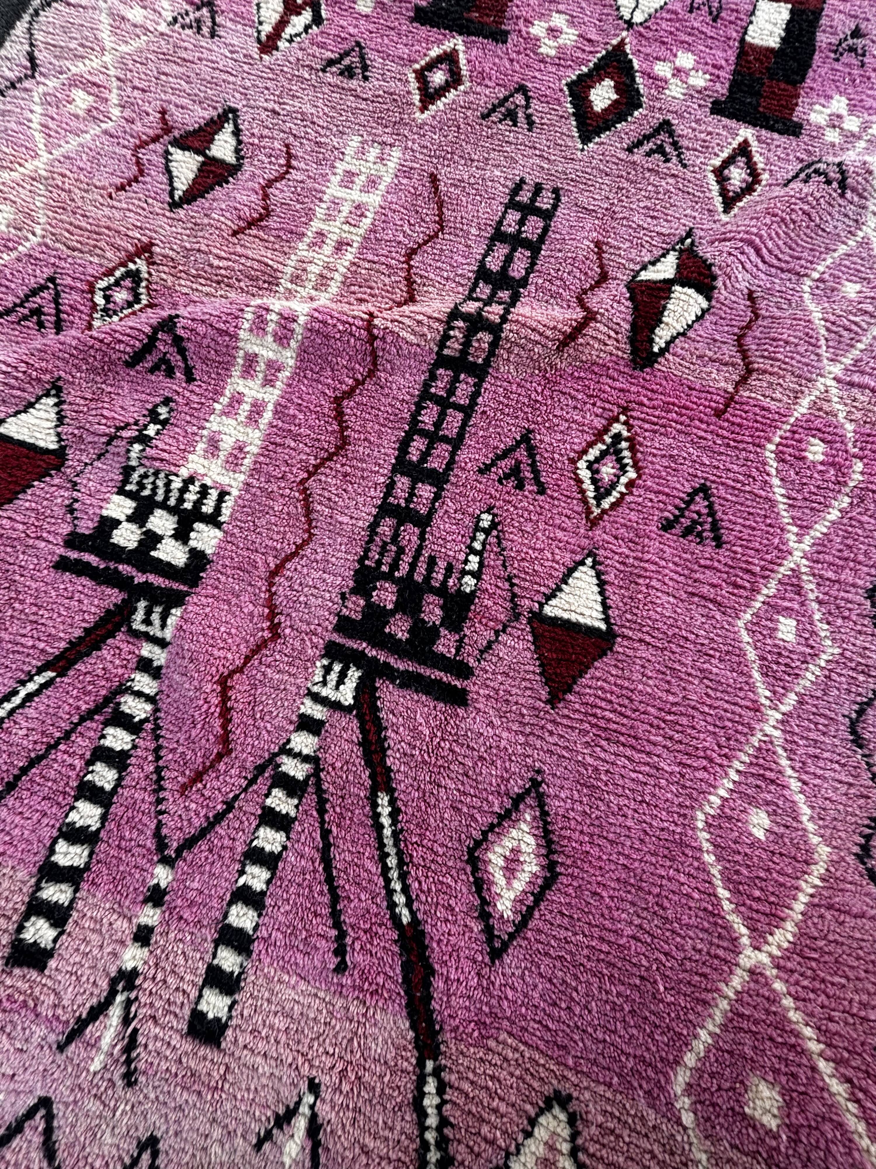 Berber Moroccan pink carpet made of wool in Morocco.