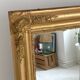 19th-century mercury mirror, in wood and gilded stucco