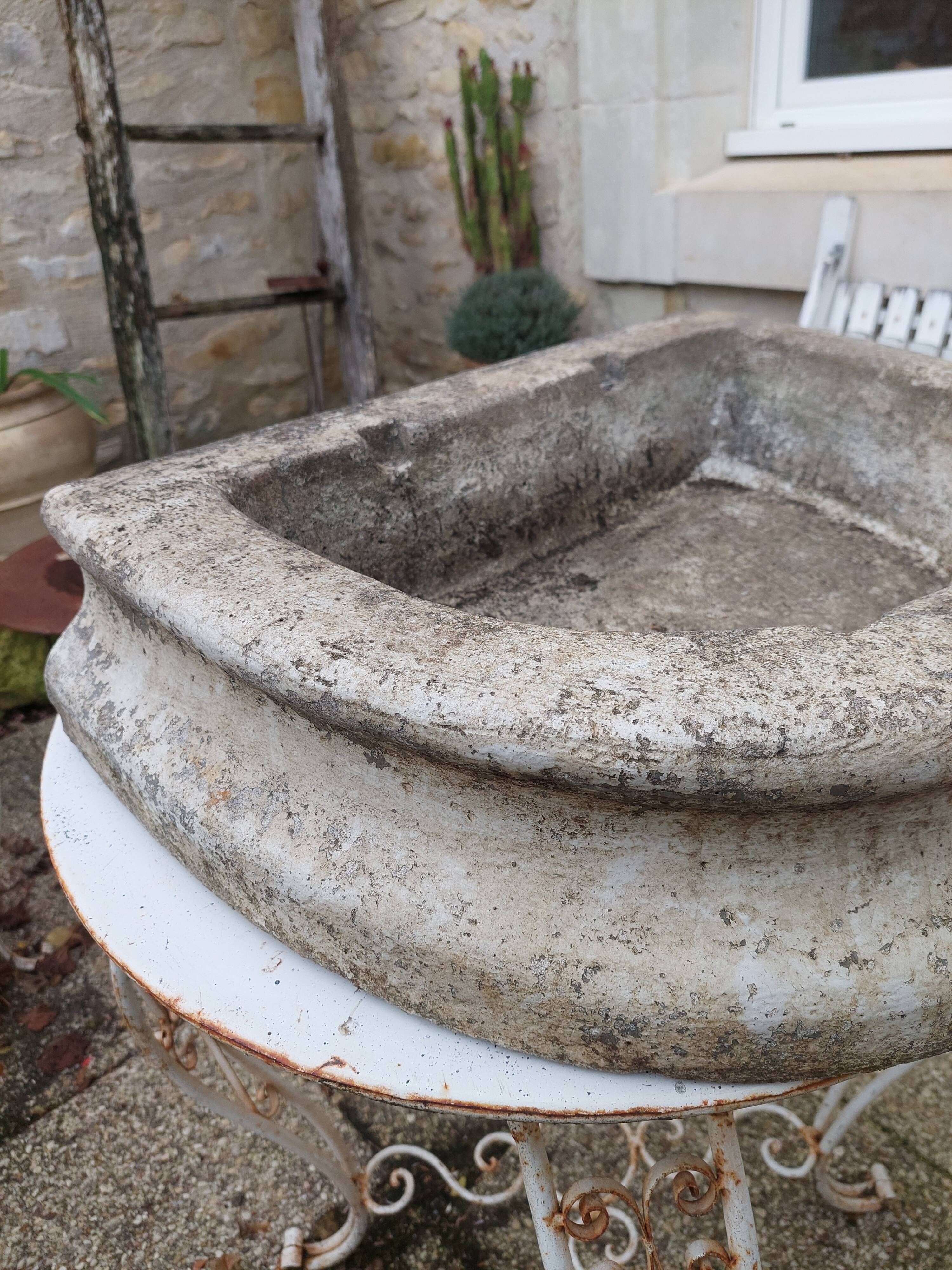 Reconstituted stone sink from the early 20th century.