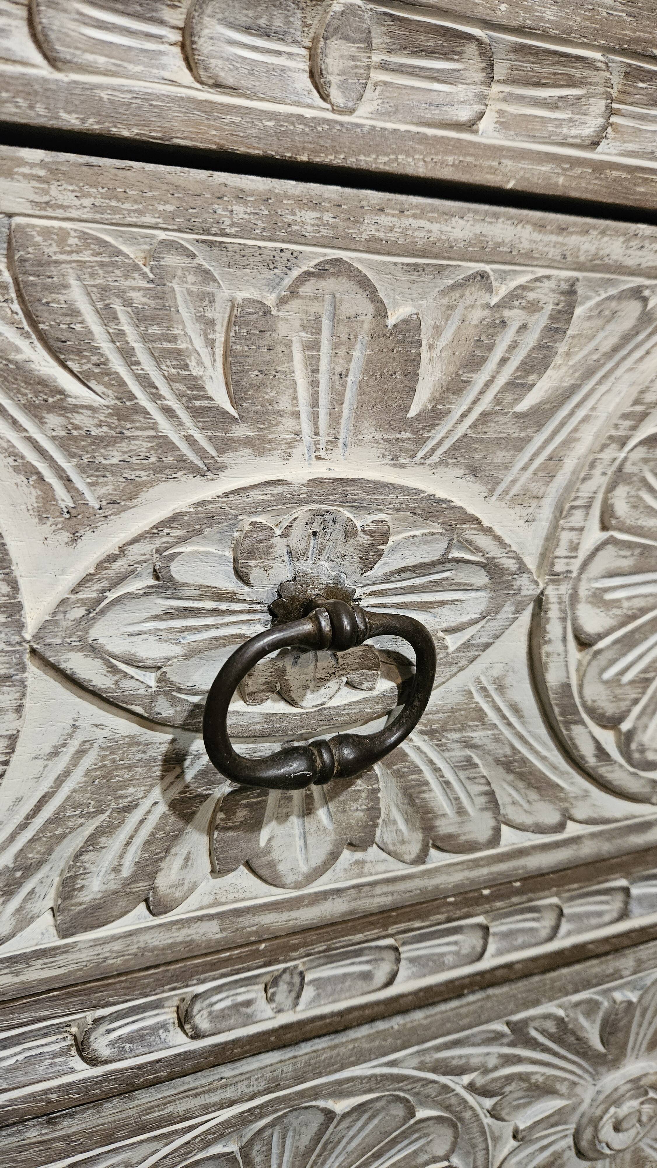 Carved chest of drawers