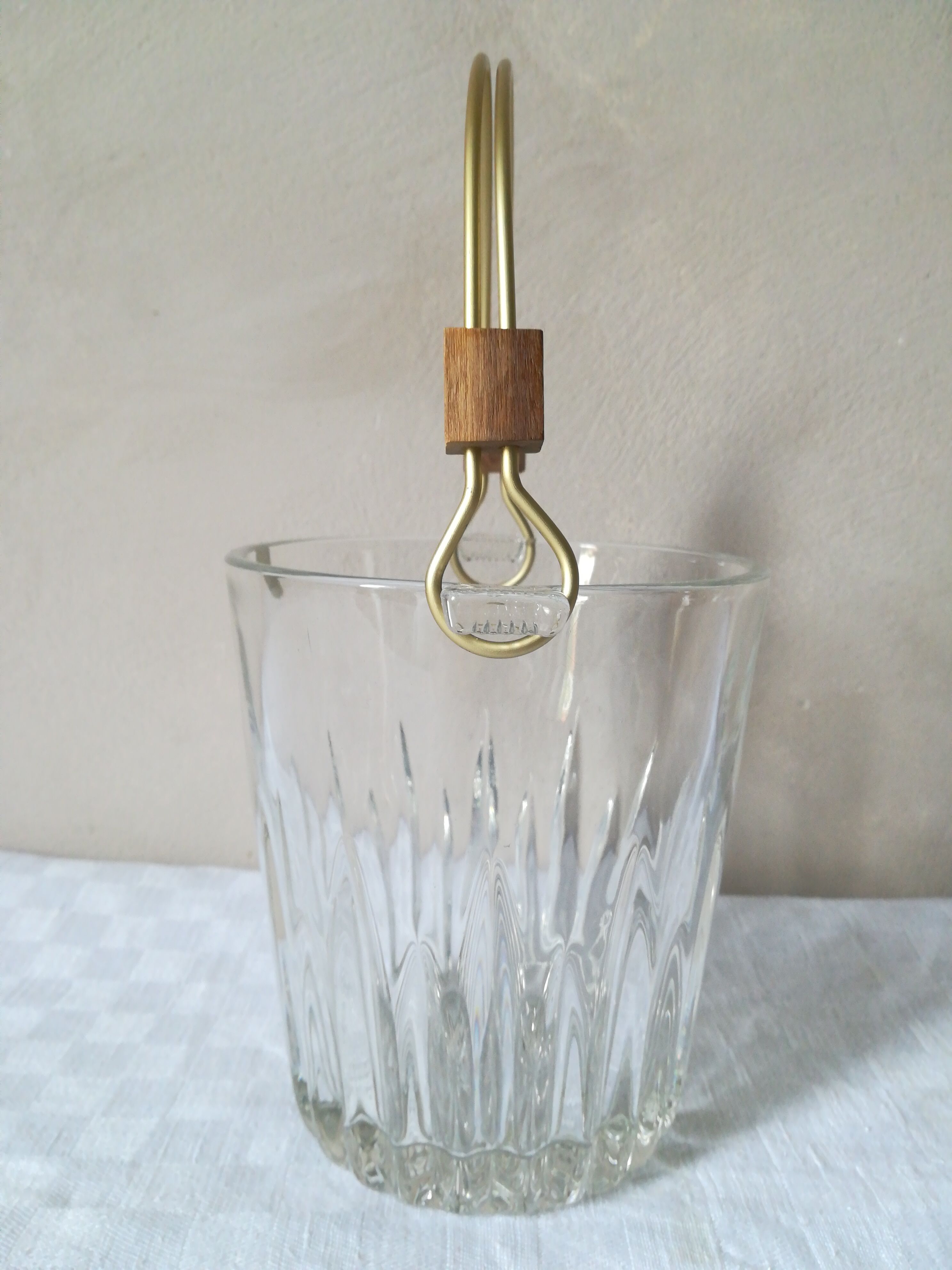 Ice bucket with gold and teak handle