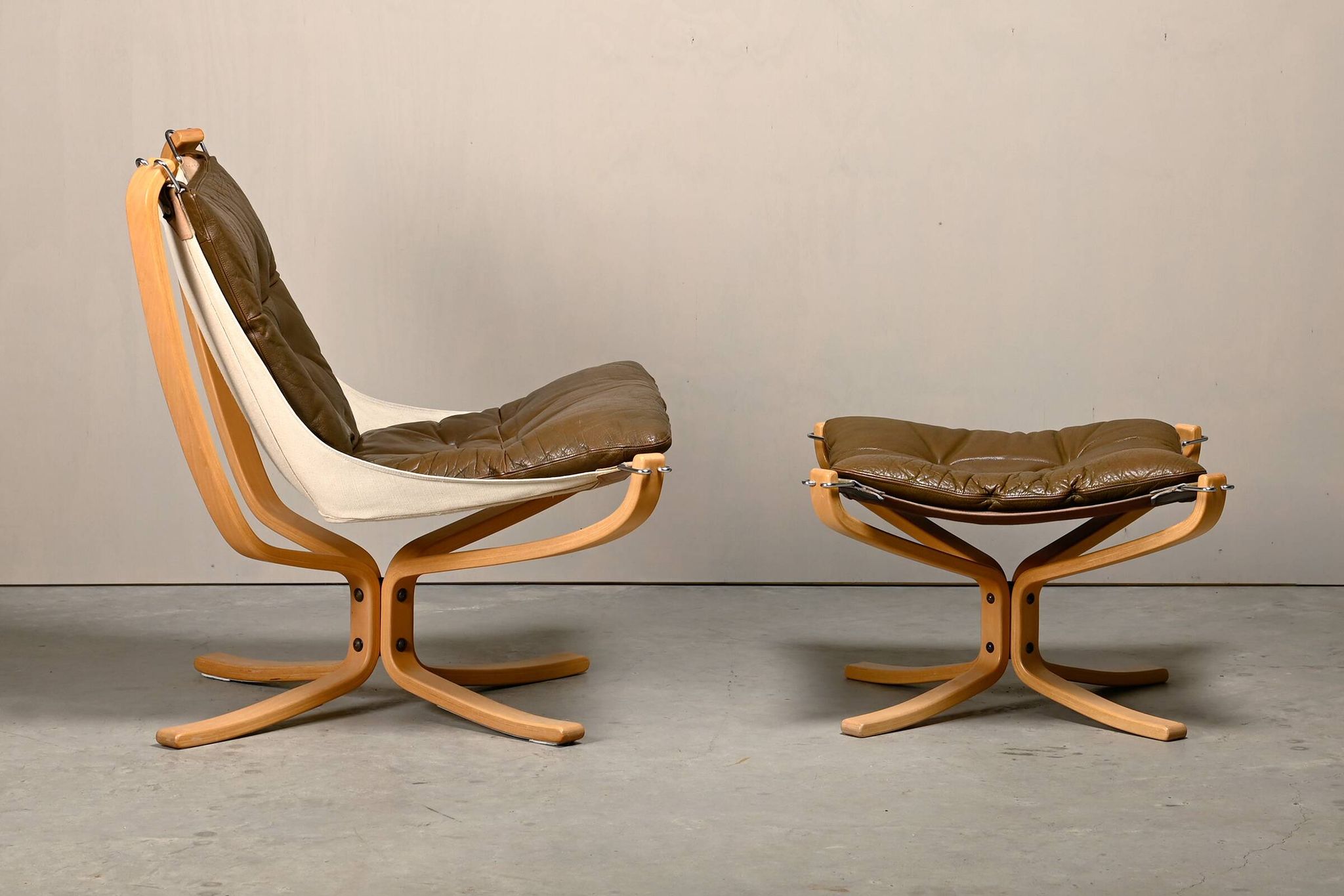 Sigurd Ressell Falcon Chair with Ottoman in brown leather for Vatne Møbler