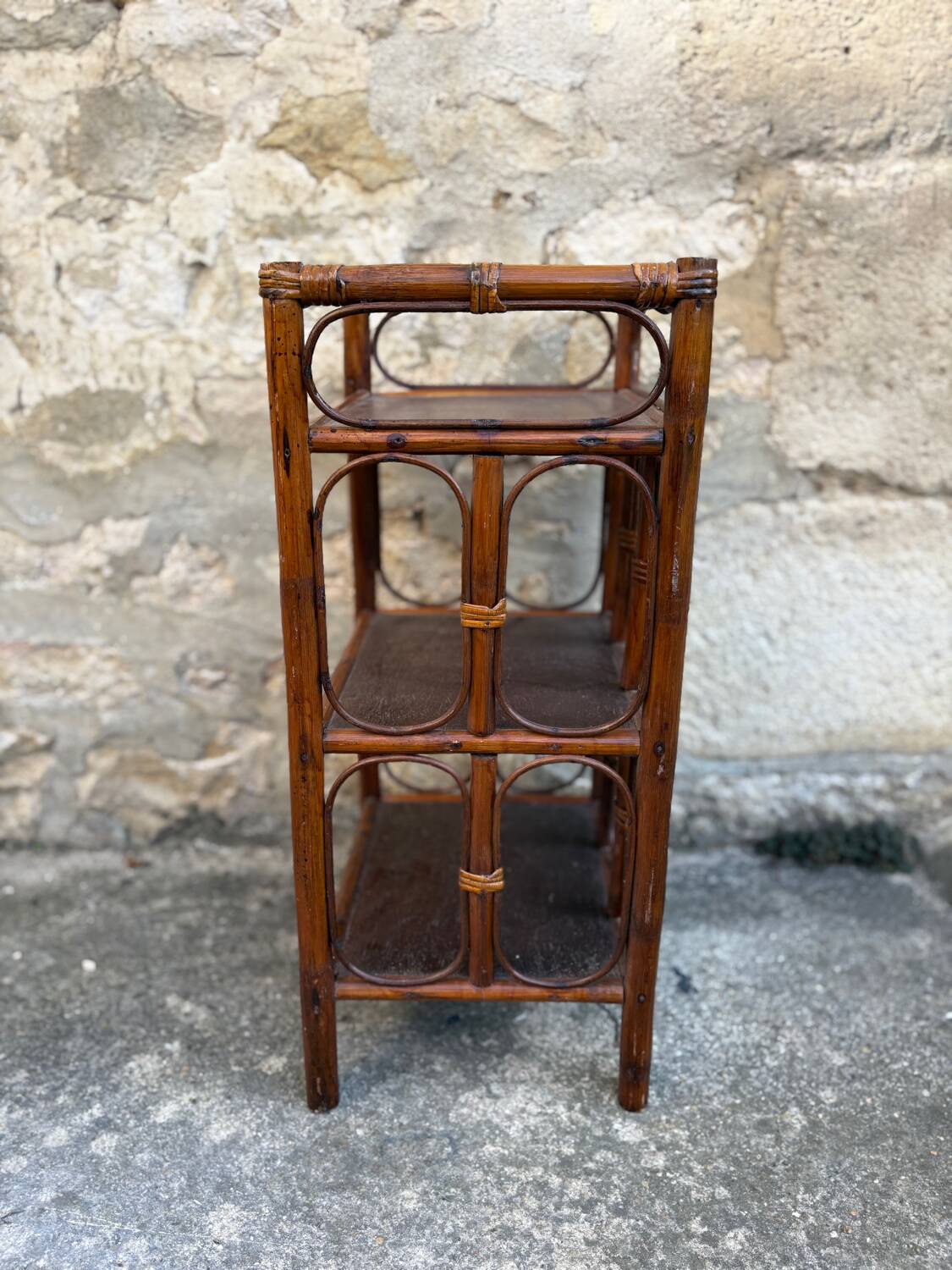 Dark brown bamboo shelf on legs