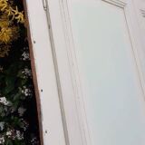 Pair of cupboard doors and old woodwork frame