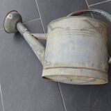 Zinc watering can with its apple