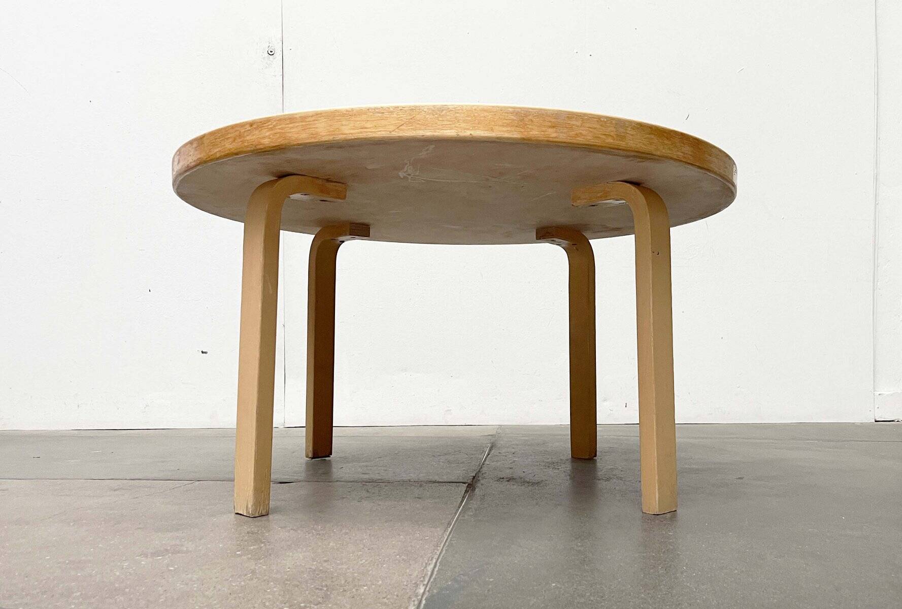 Mid-century modern yellow linoleum coffee table by Alva Aalto for Artek, Finland, 1960s.