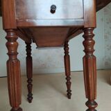 Pair of Louis Philippe style walnut bedside tables / work tables with flap