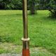 Vintage tripod floor lamp from the 60s in wood and brass