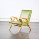 Fauteuil en skaï vert