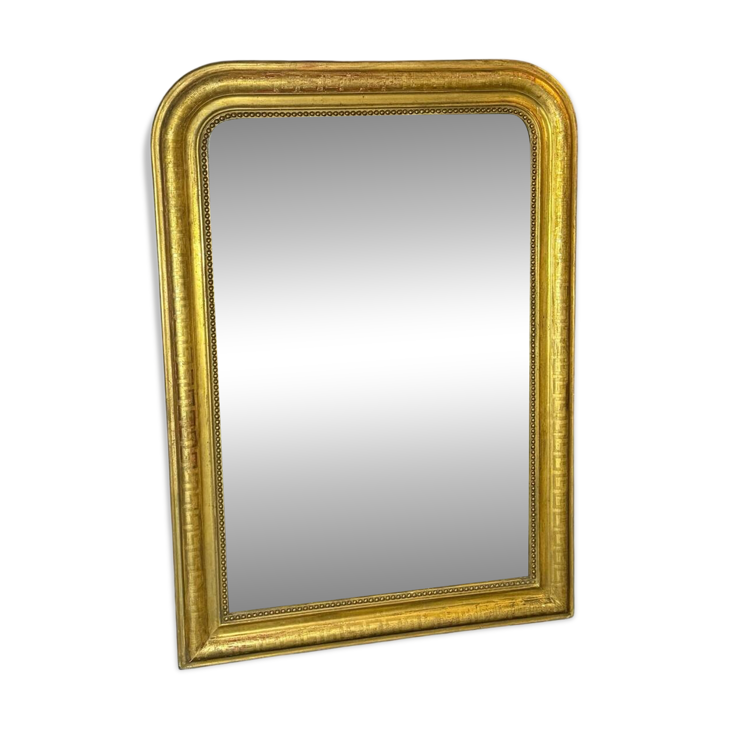 Large Louis Philippe mirror in wood and gilded stucco, 19th century.