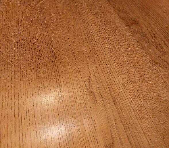 Round wooden table with concrete tulip base