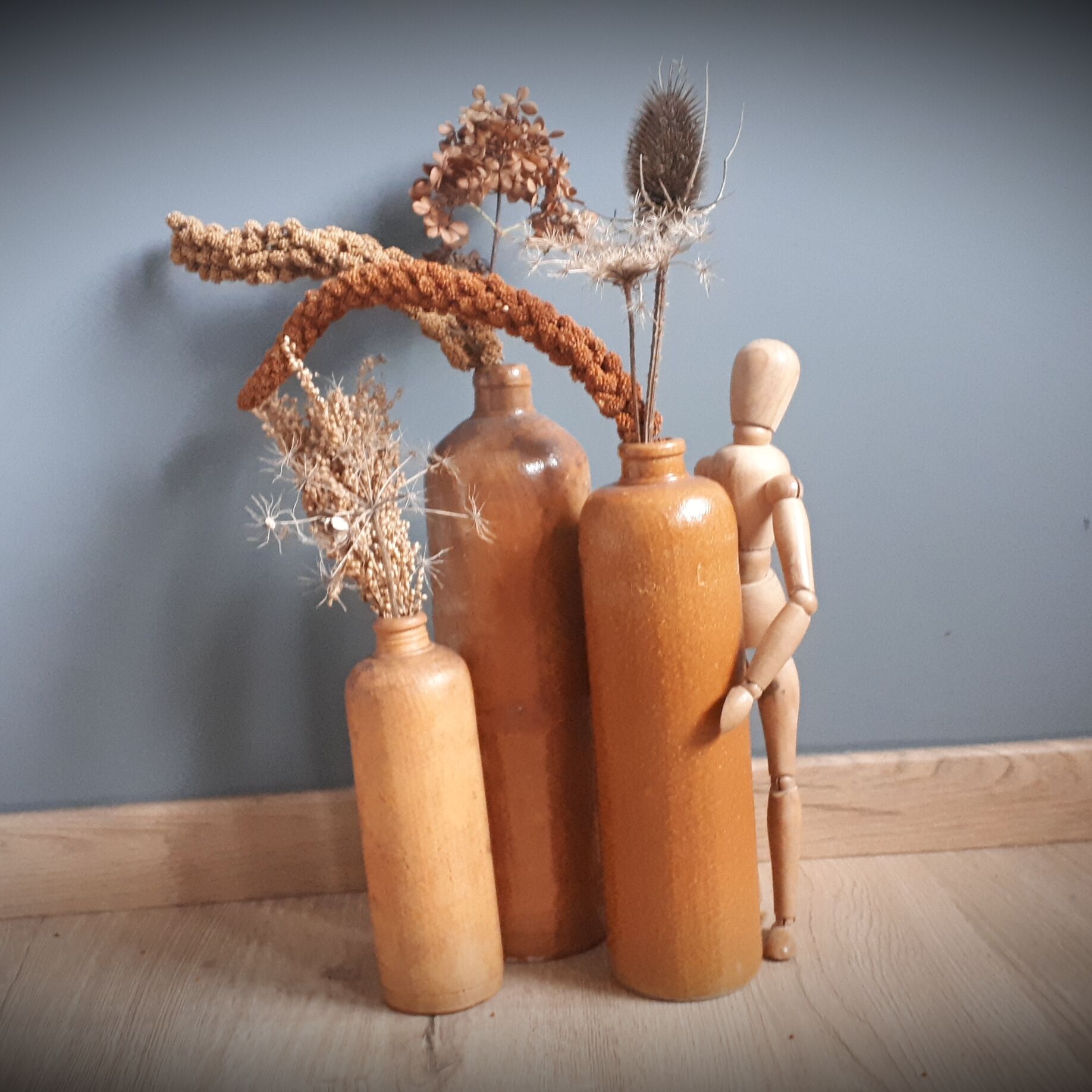 Trio of sandstone bottles 3