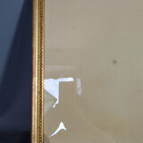 Old frame beaded decoration, gilded stucco wood