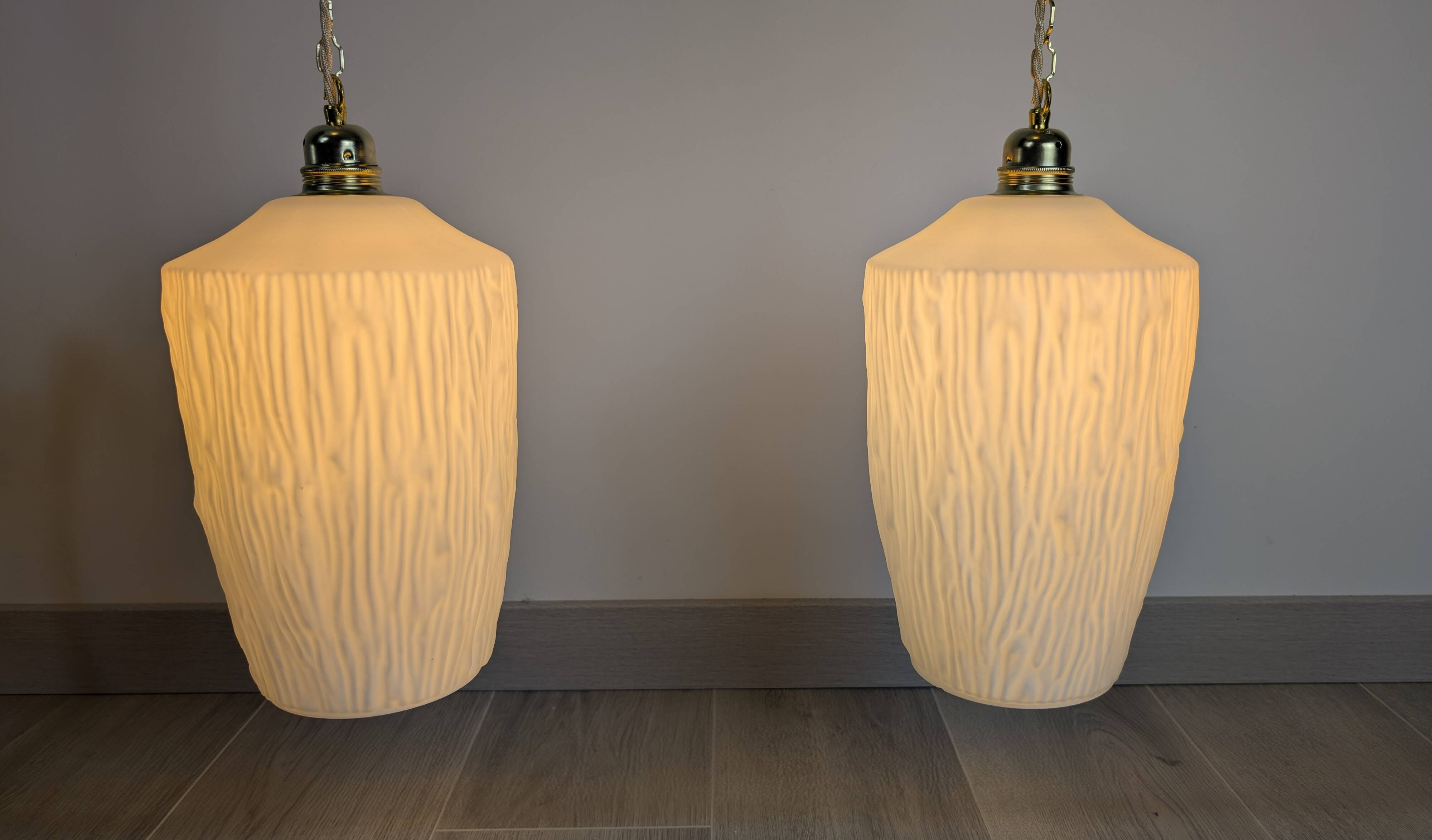 Pair of opaline pendants from the 1960s, luminous simplicity, 140 cm.