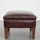 Ottoman vintage en cuir de mouton