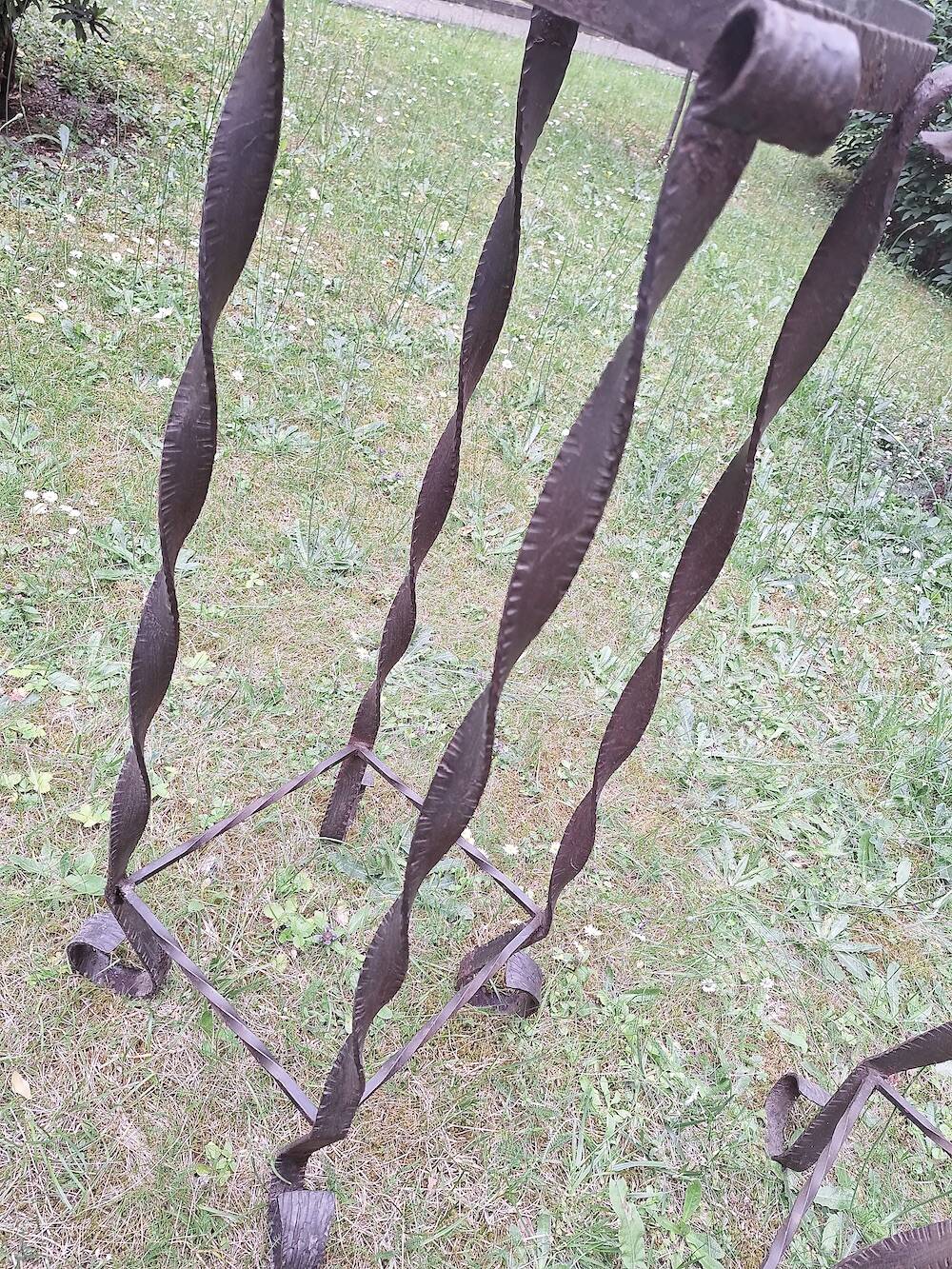 Pair of Brutalist patinated iron and veined marble columns, 1960s