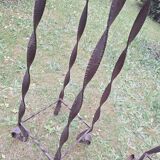 Pair of Brutalist patinated iron and veined marble columns, 1960s