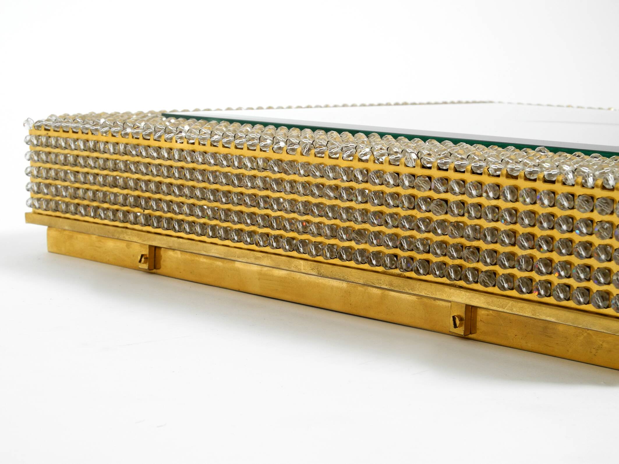 1960s brass wall backlit mirror, frame with glass beads by Palwa