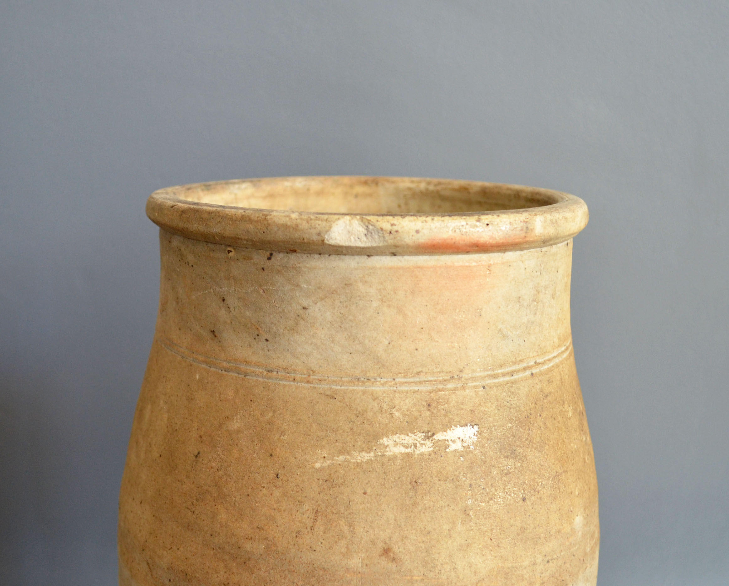 two jugs - old pots in matt sandstone