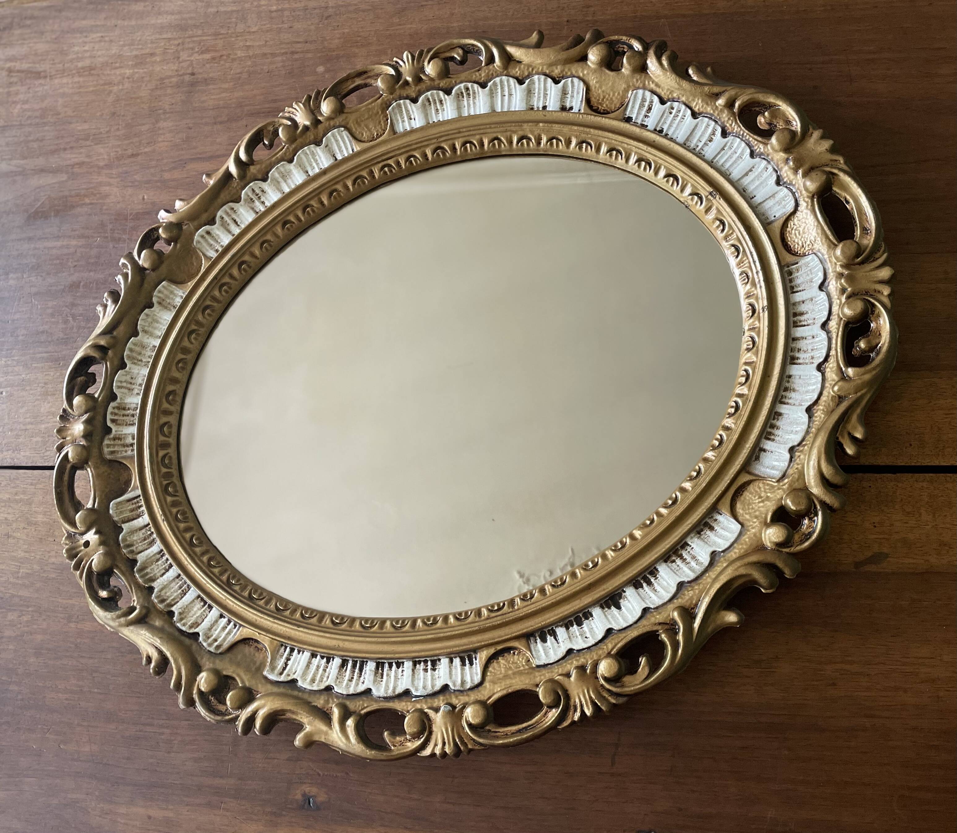 Kitsch 70s gold resin oval mirror