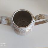 White terracotta pourer
