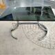 Table basse années 70 plateau de verre, piétement chromé avec porte-revues