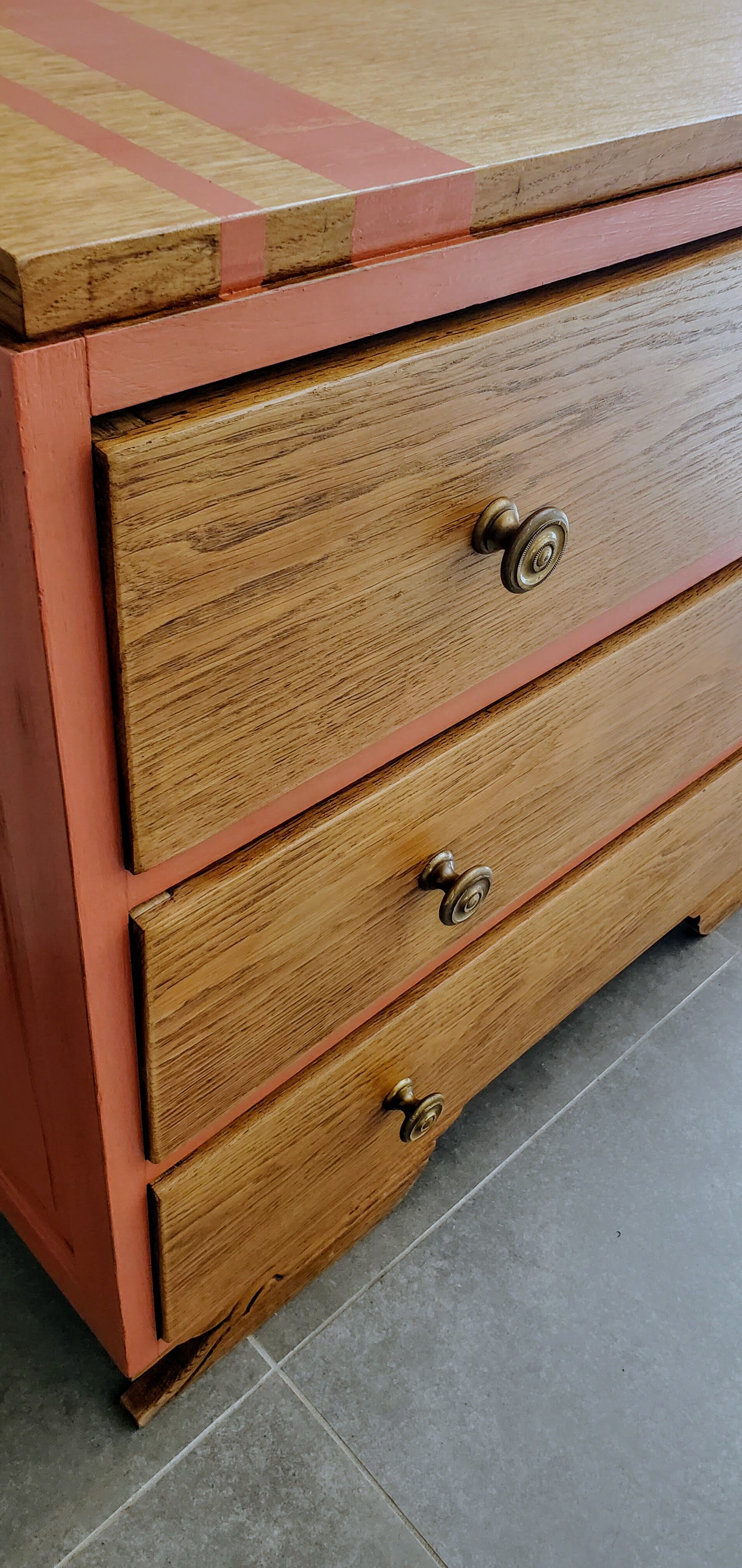Terracotta patina oak chest of drawers