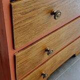 Terracotta patina oak chest of drawers