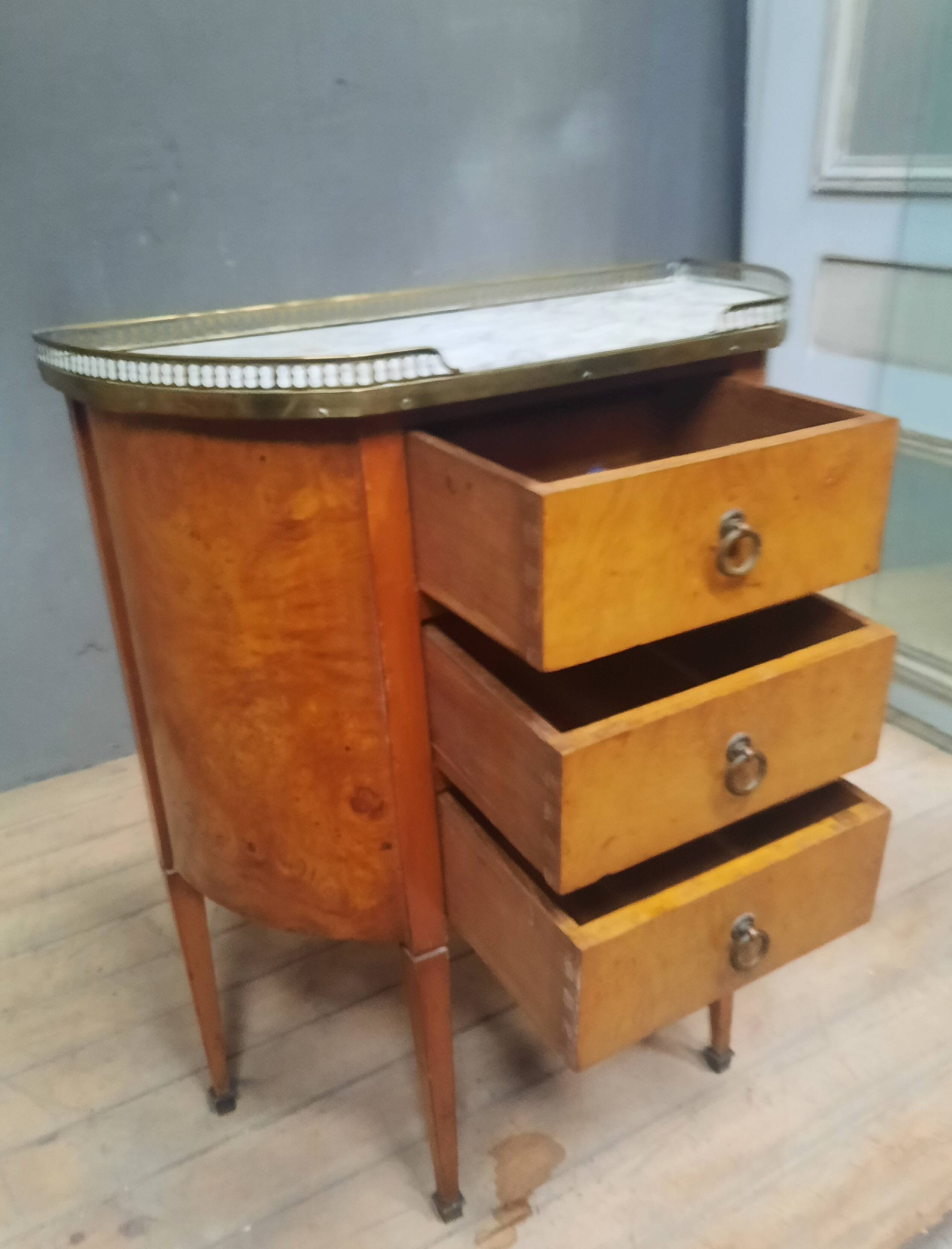 Small Louis XVI style chest of drawers with rounded sides