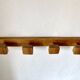 Wall-mounted coat rack with 4 wooden hooks