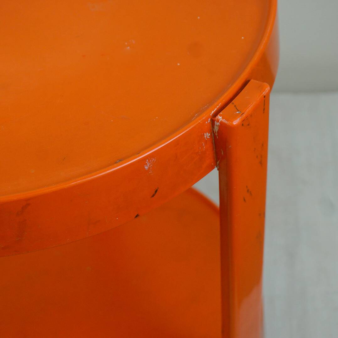 Circular orange Italian Space Age plastic trolley