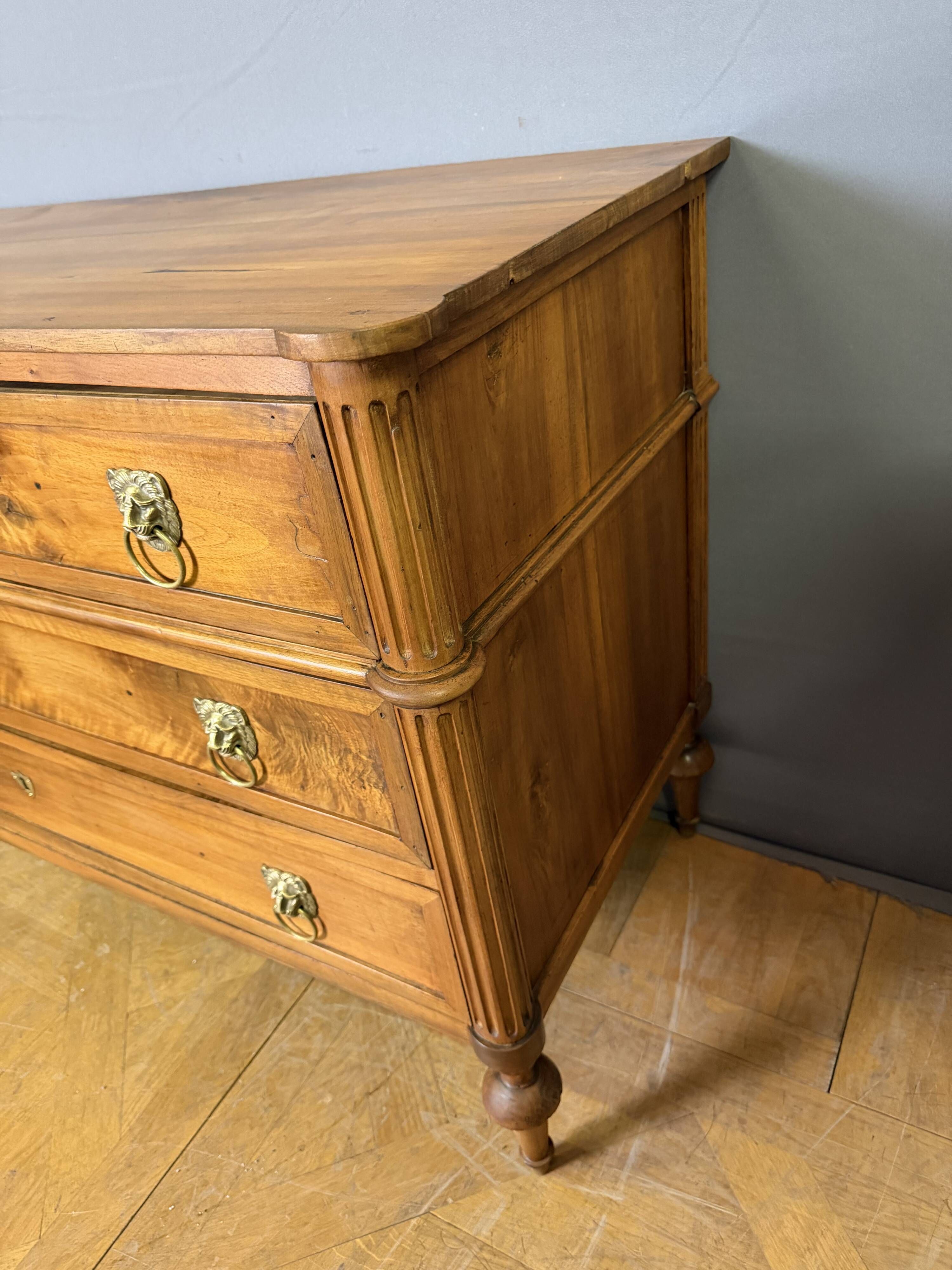 Louis XVI period commode in light walnut.