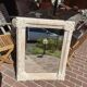 Carved mirror