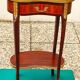 Louis XVI period pedestal table, in solid mahogany and veneer, and in gilded bronze.