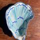 Lot of 2 oyster-shaped bowls.