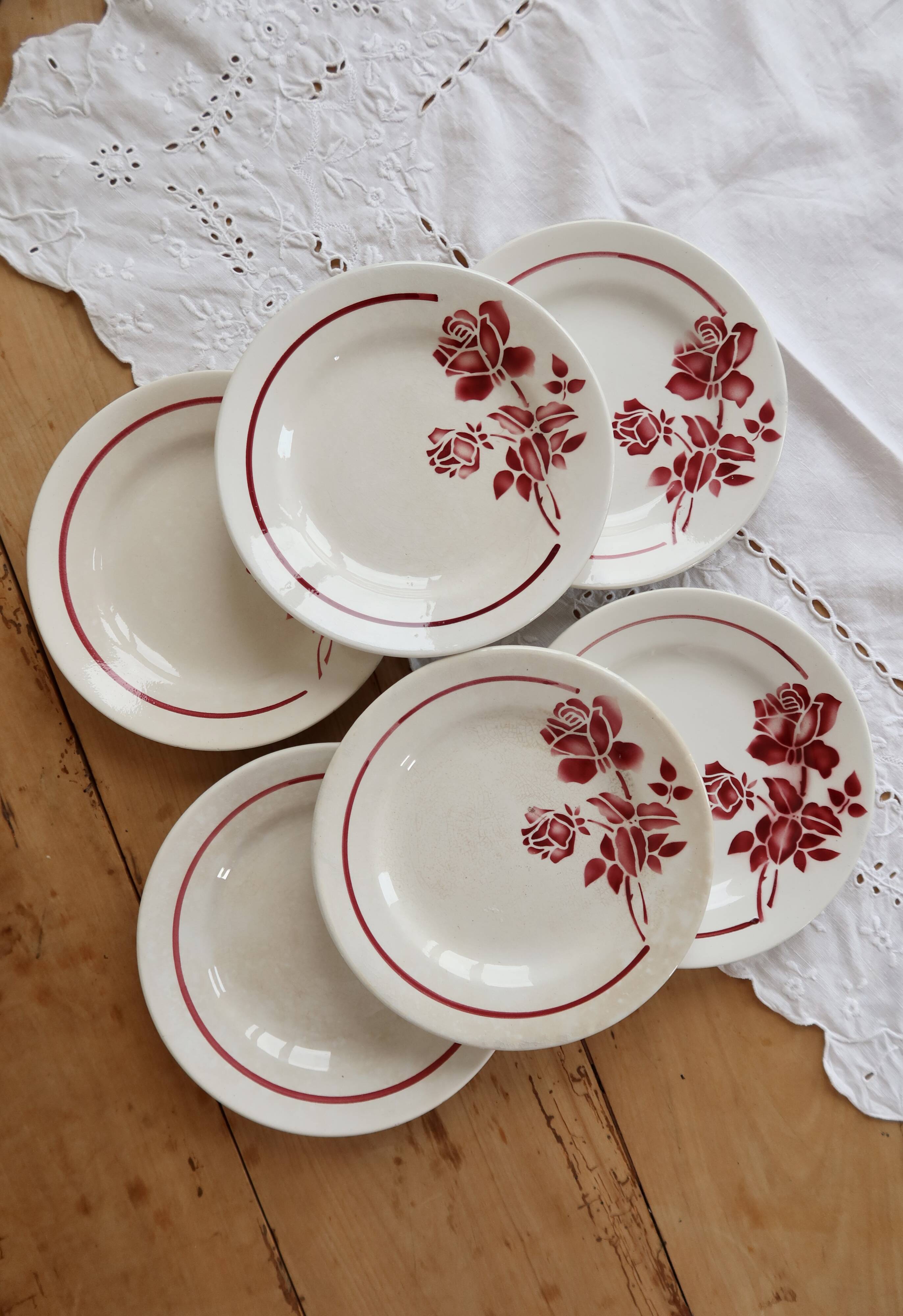 6 vintage dessert plates Moulin des Loups with burgundy floral decoration.