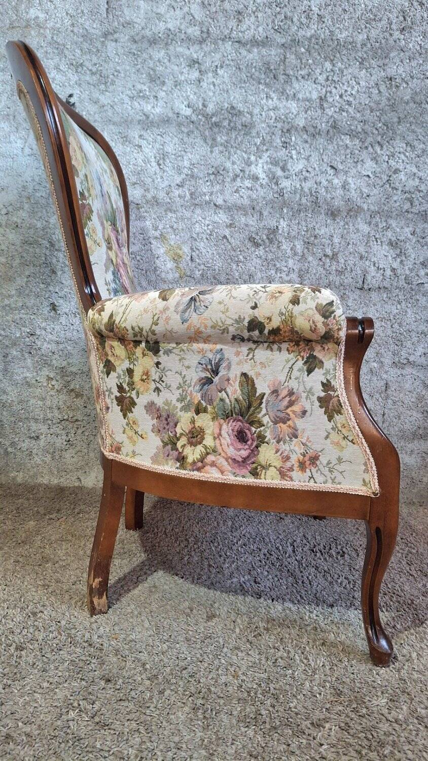 Louis XV style armchair with floral jacquard upholstery.