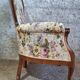 Louis XV style armchair with floral jacquard upholstery.