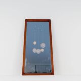 Modern Swedish mirror in mahogany from the 1940s.