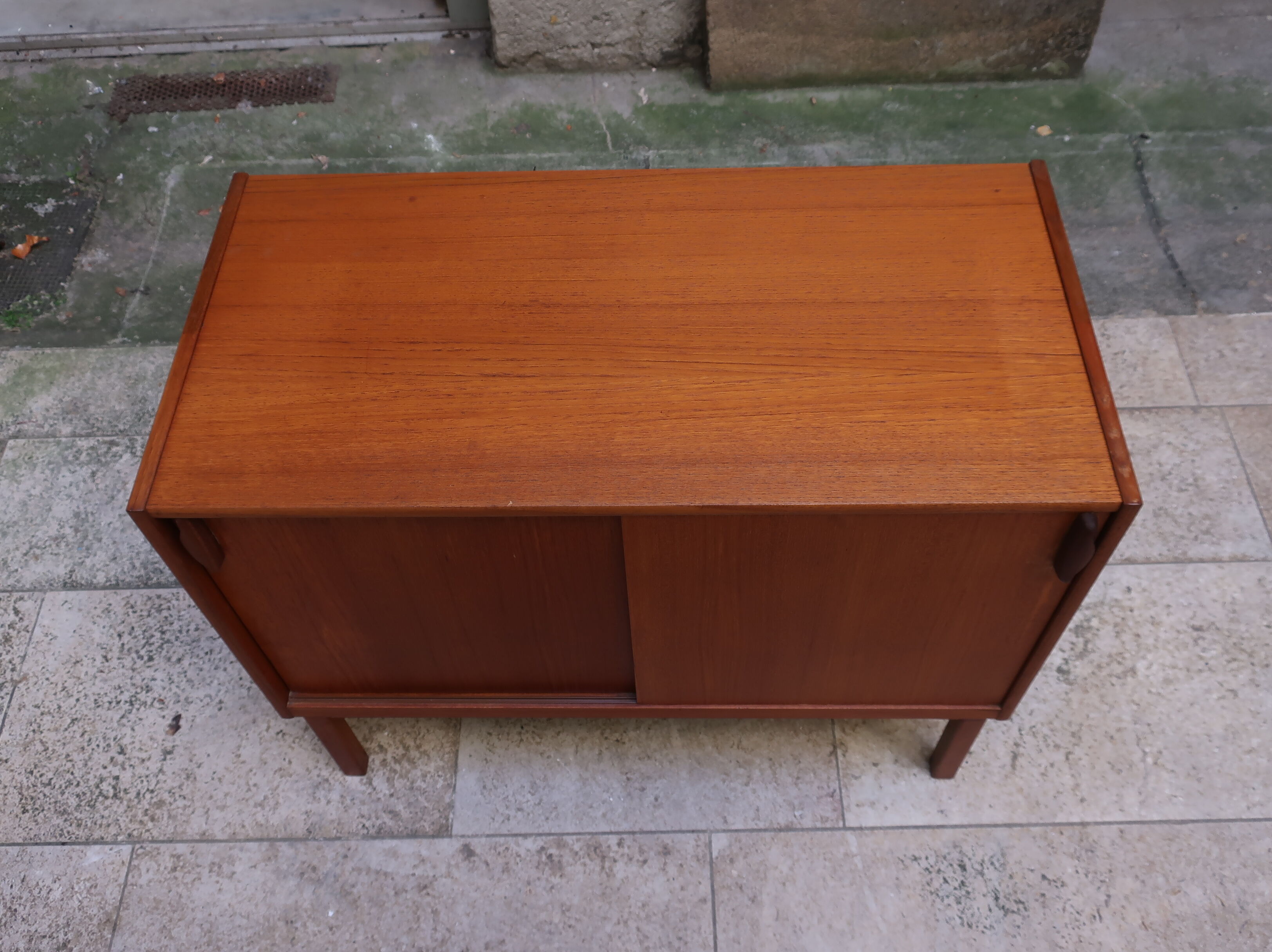 Two-door teak storage unit from the 1960s