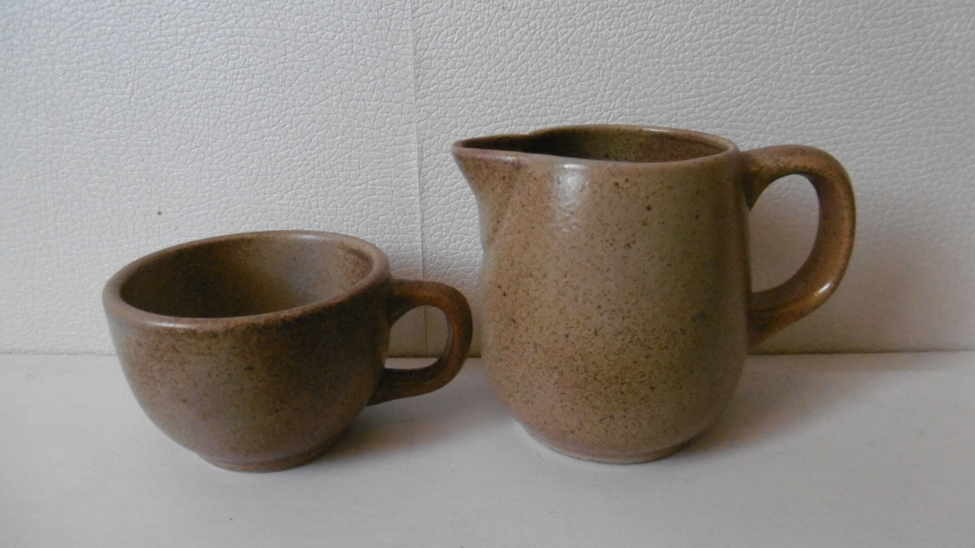 Berry cups and sandstone milk pot